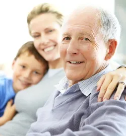 Grandfather and family looking happy