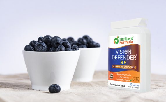 bowl of bilberries and pack of Vision Defender BP