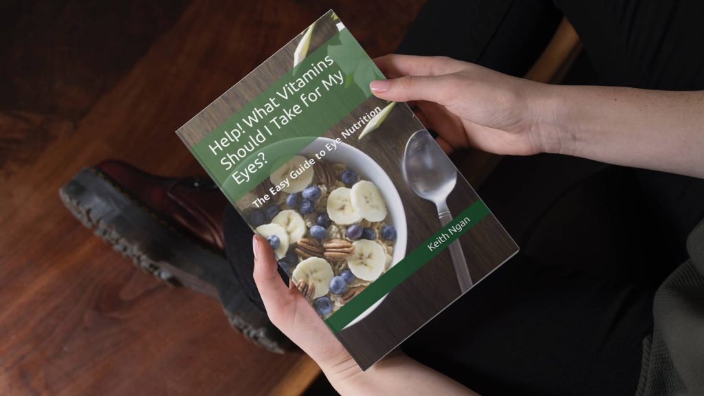 Person holding Help! What Vitamins Should I Take for My Eyes book